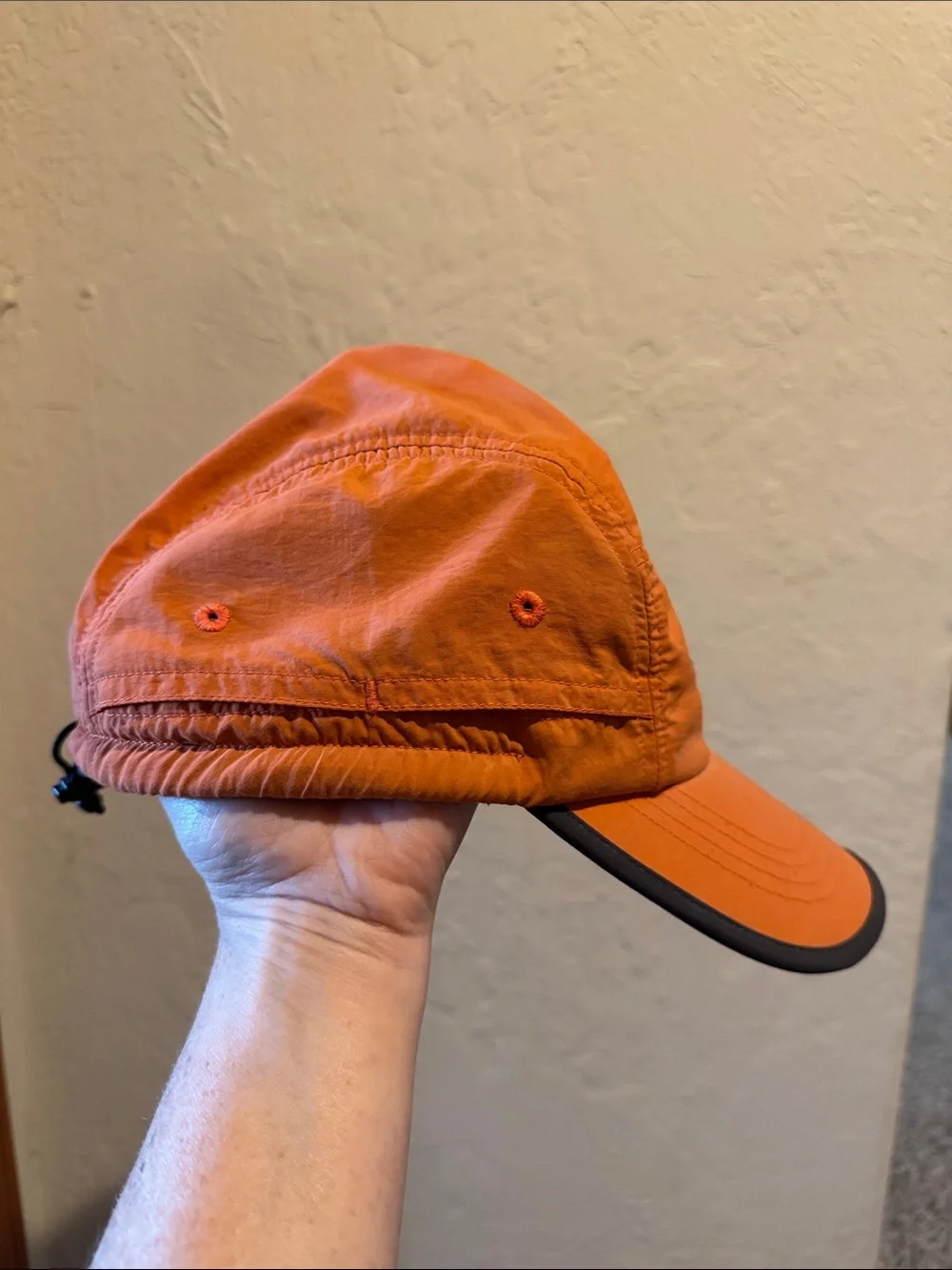 The North Face Orange Men's Trail Hat with Black Logo